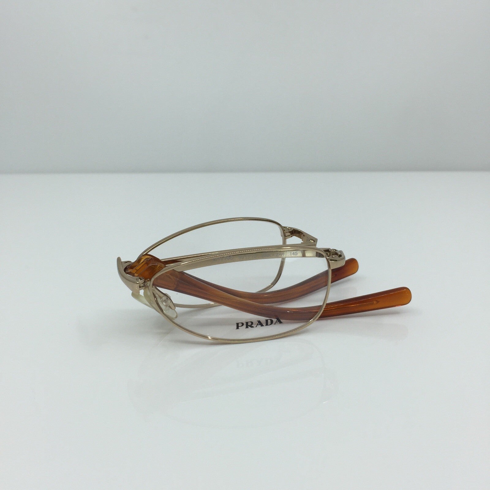 Vintage Prada VPR 76C Gold Eyeglasses - Super Vision Optical