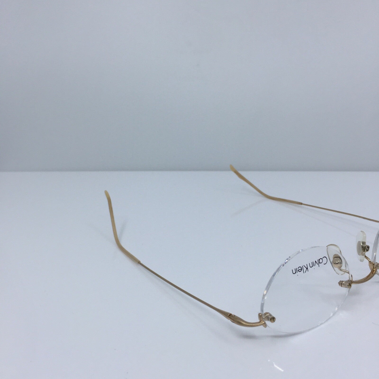 Vintage Calvin Klein CK 520 Gold Sunglasses - Super Vision Optical