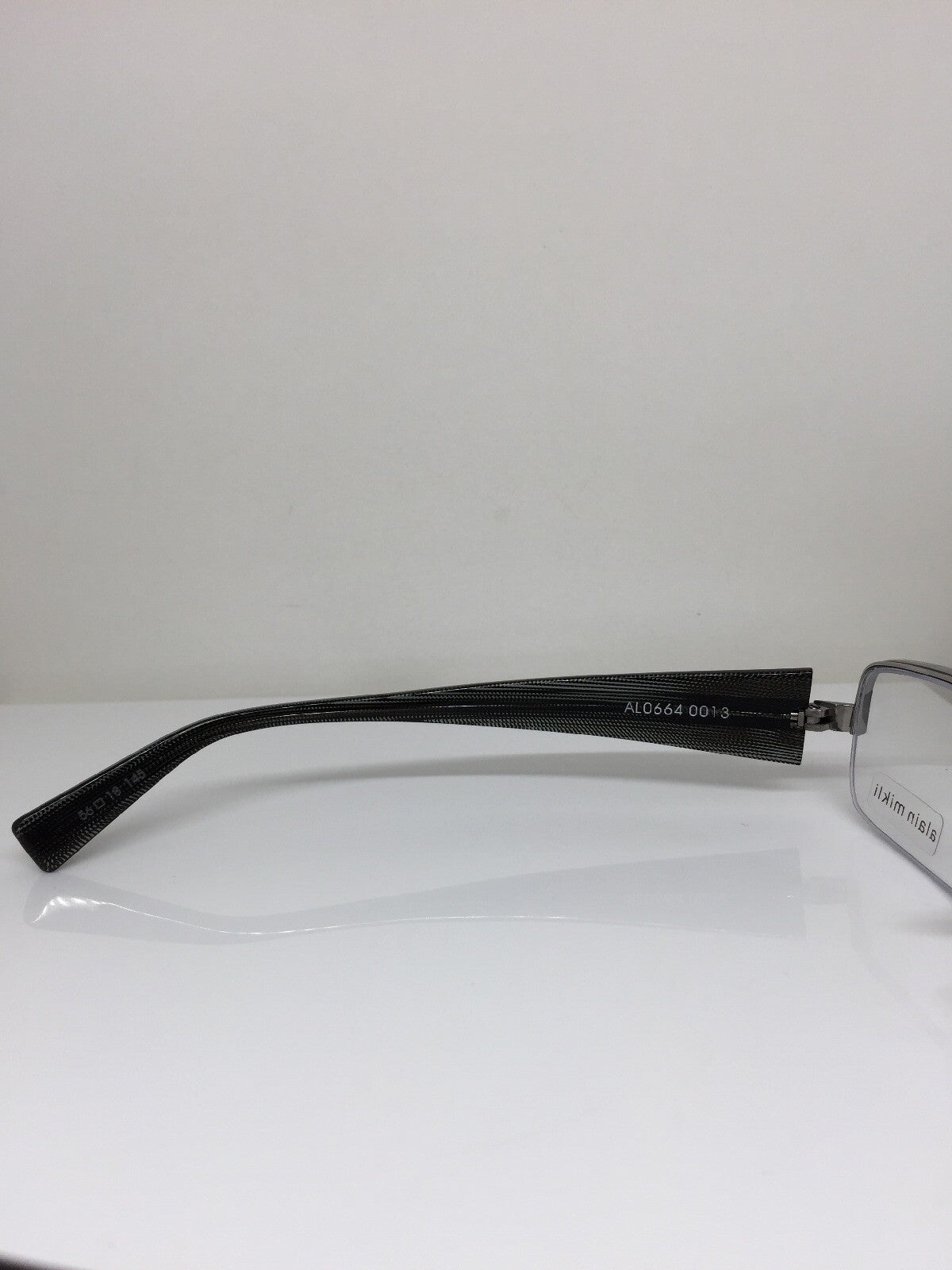 Vintage Alain Mikli AL 0664-0013 Silver Sunglasses - Super Vision Optical