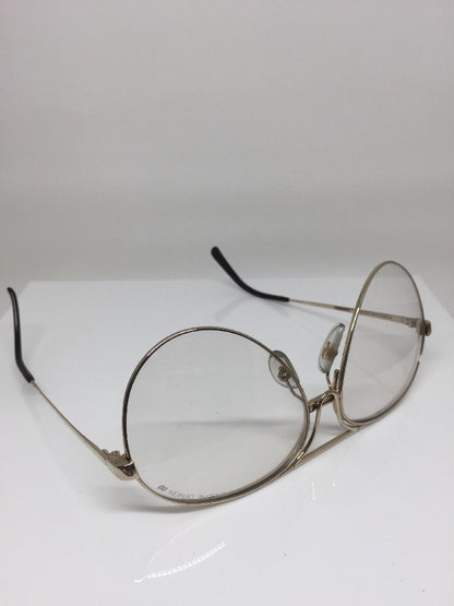 Vintage Porsche Design P5657 Gold Sunglasses - Super Vision Optical