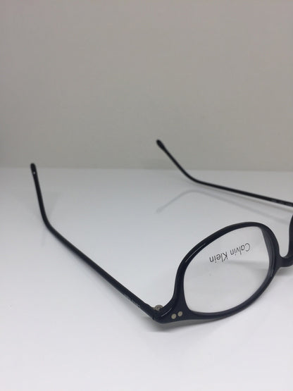 Vintage Calvin Klein CK 727 Black Sunglasses - Super Vision Optical