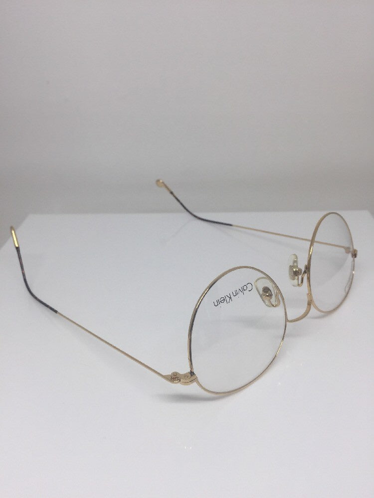 Vintage Calvin Klein CK 114 Gold Sunglasses - Super Vision Optical