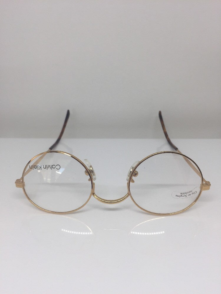 Vintage Calvin Klein CK 132 Gold Sunglasses - Super Vision Optical