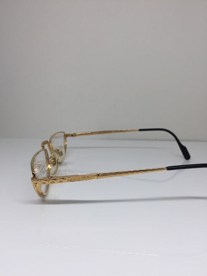 Vintage Tiffany Lunettes Tiffany Lunettes T77 Gold Sunglasses - Super Vision Optical