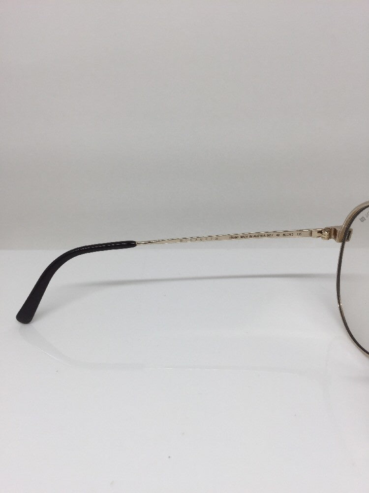 Vintage Porsche Design P5657 Gold Sunglasses - Super Vision Optical