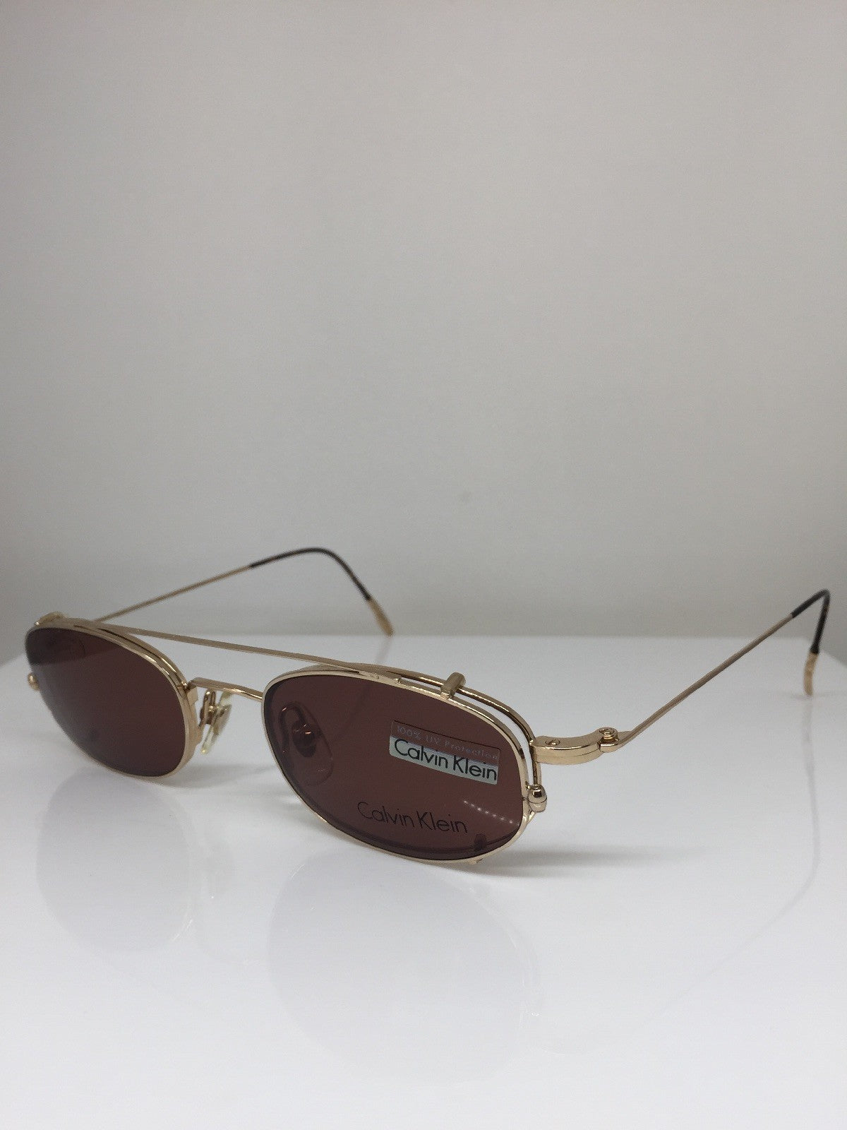 Vintage Calvin Klein CK 145 Gold Sunglasses - Super Vision Optical