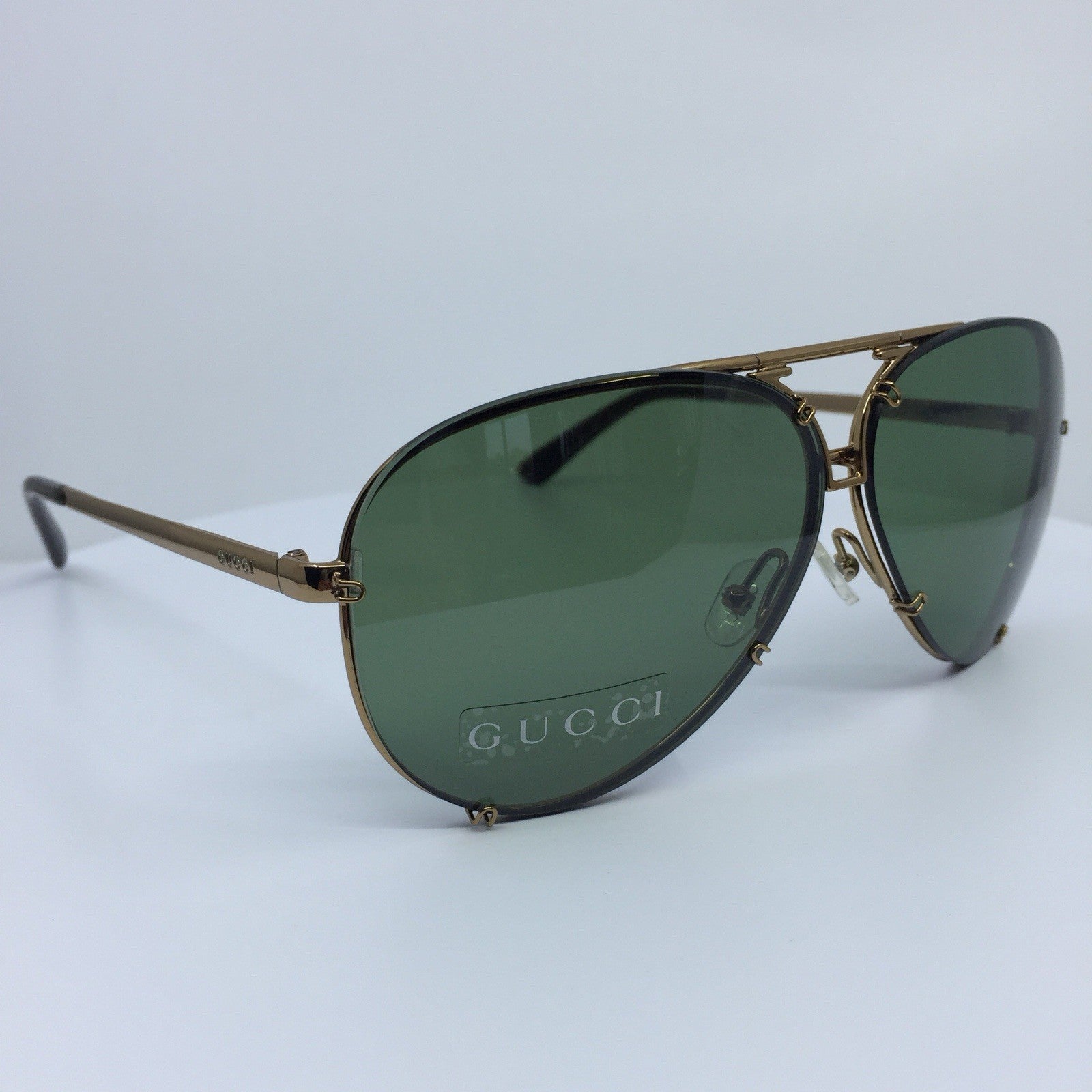 Vintage Gucci GG 1687/S Gold Sunglasses - Super Vision Optical