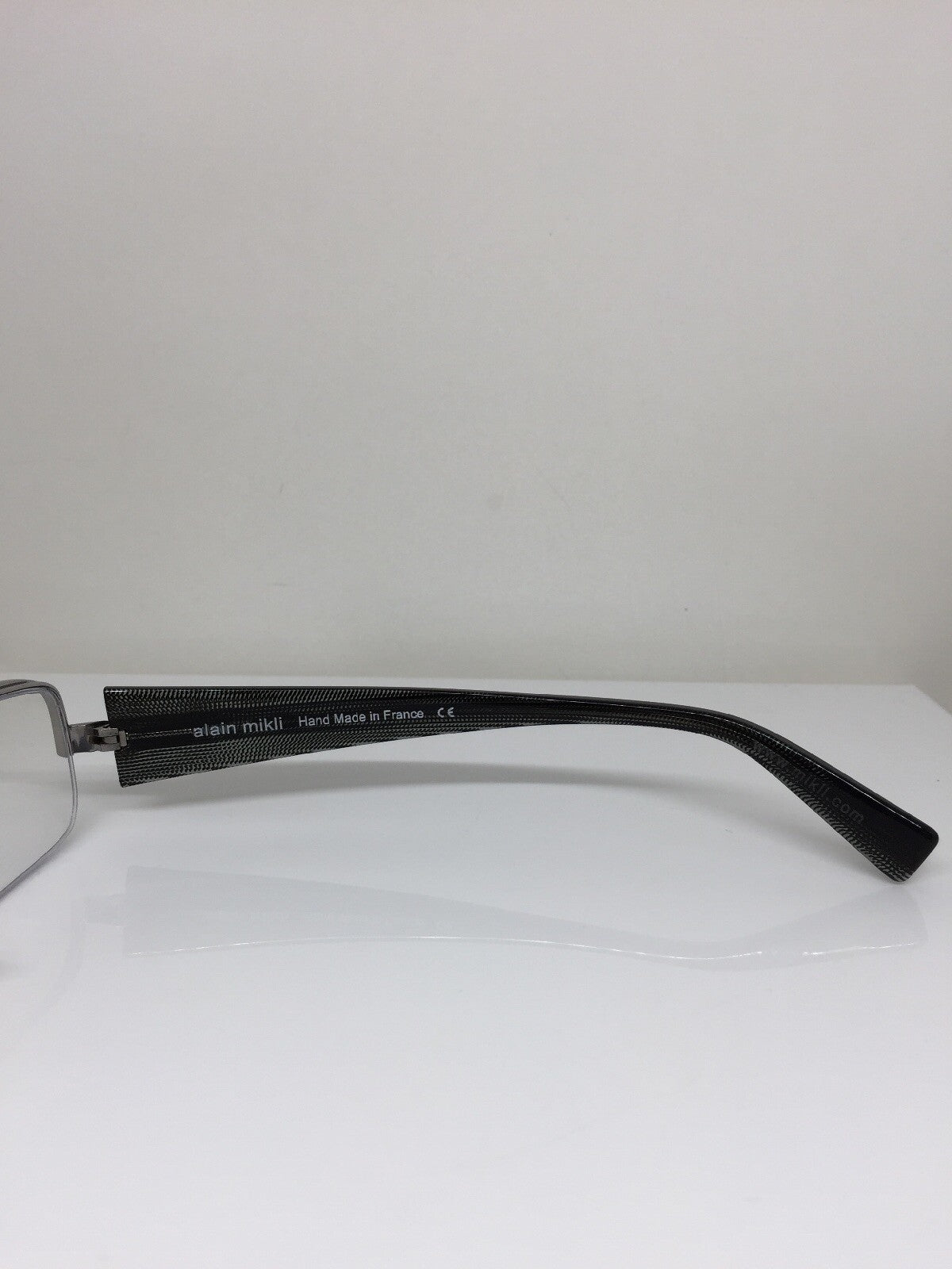 Vintage Alain Mikli AL 0664-0013 Silver Sunglasses - Super Vision Optical