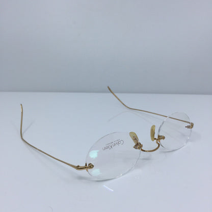 Vintage Calvin Klein CK CLASSIC EDITIONS C9 Gold Sunglasses - Super Vision Optical