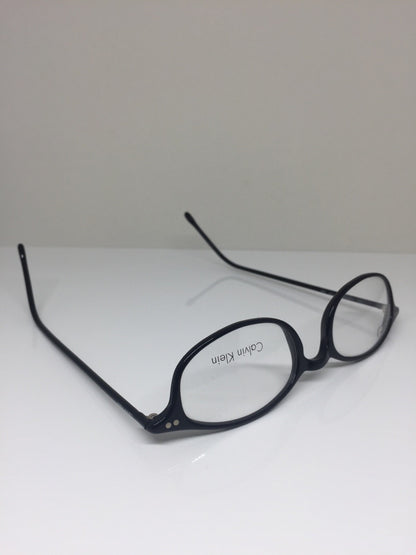 Vintage Calvin Klein CK 727 Black Sunglasses - Super Vision Optical