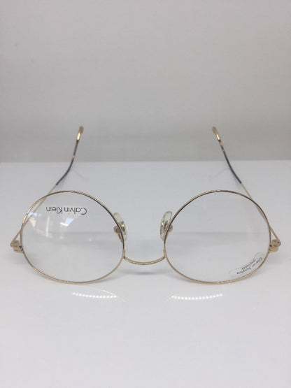 Vintage Calvin Klein CK 114 Gold Sunglasses - Super Vision Optical