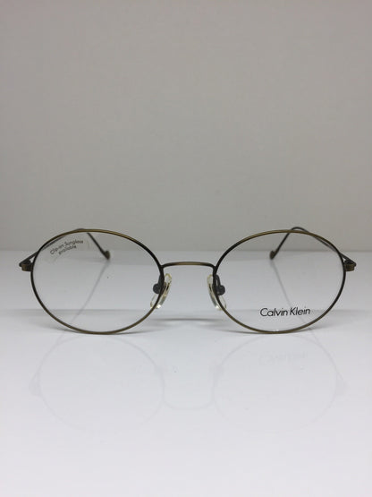 Vintage Calvin Klein CK 115 Gold Sunglasses - Super Vision Optical