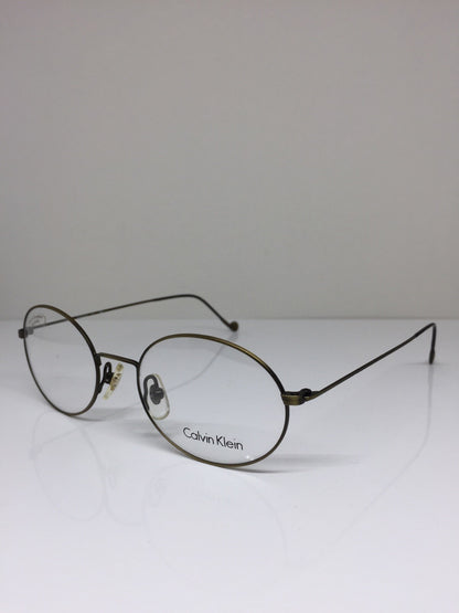 Vintage Calvin Klein CK 115 Gold Sunglasses - Super Vision Optical