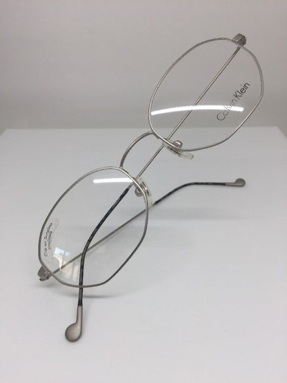 Vintage Calvin Klein CK 138 Gold Sunglasses - Super Vision Optical
