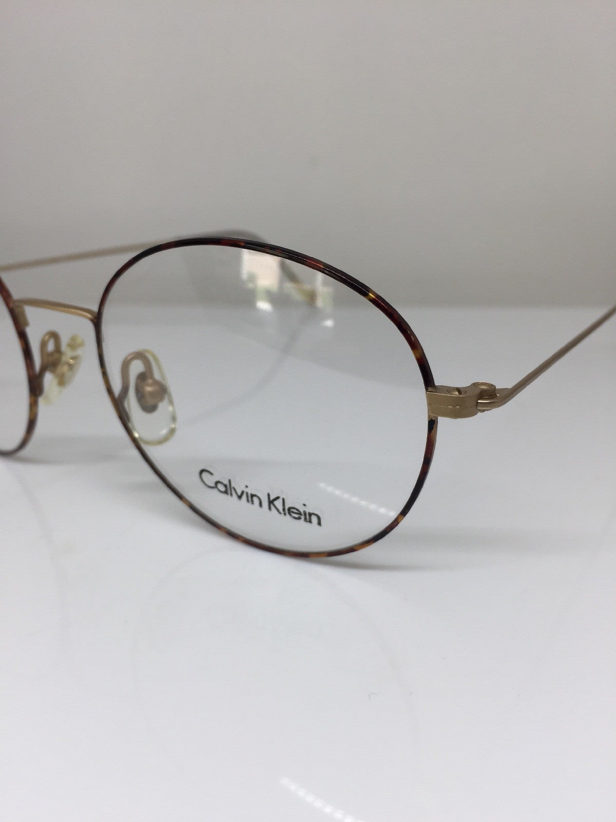 Vintage Calvin Klein CK 114 Gold Sunglasses - Super Vision Optical