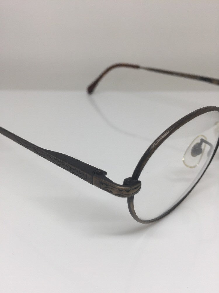 Vintage Calvin Klein CK 117 Brown Sunglasses - Super Vision Optical