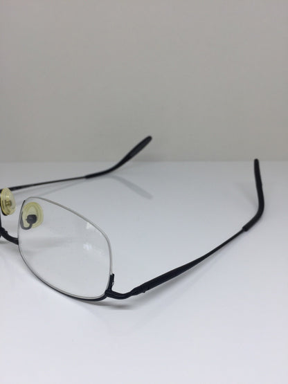 Vintage Porsche Design P7002 Black Sunglasses - Super Vision Optical