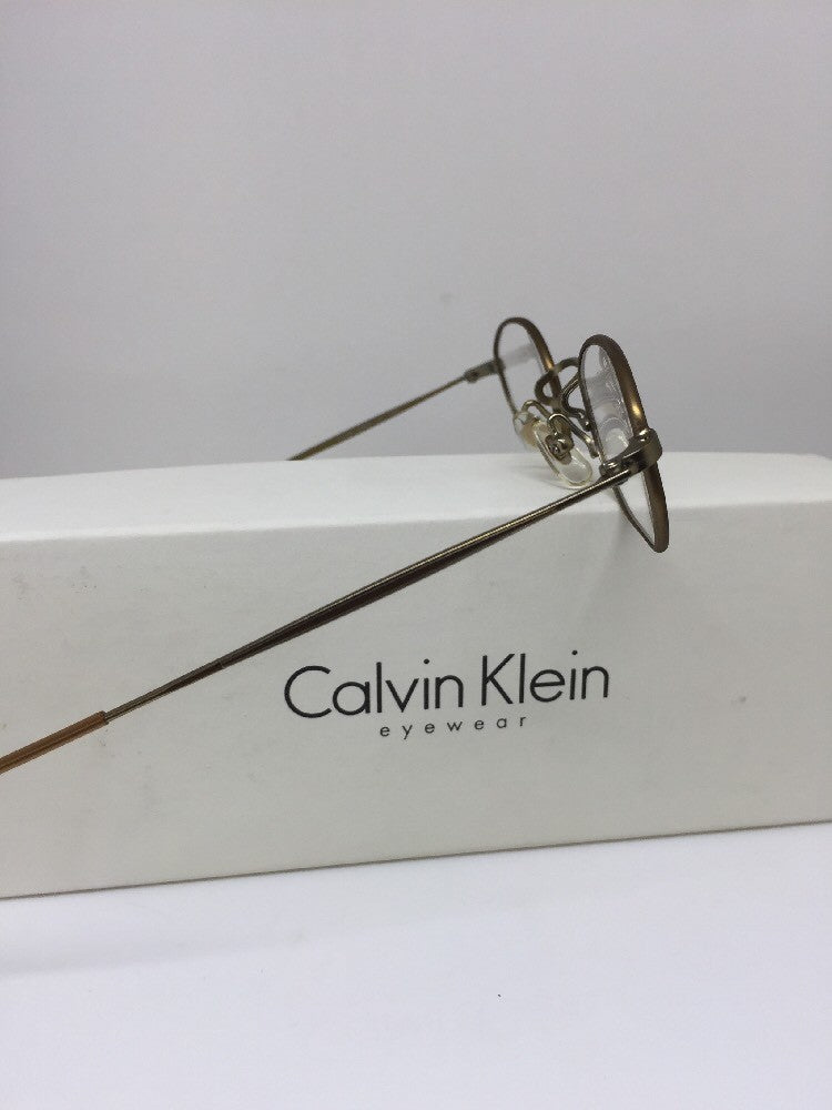 Vintage Calvin Klein CK 339 Gold Sunglasses - Super Vision Optical