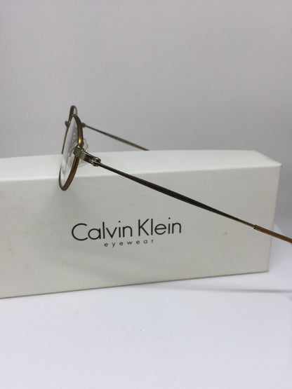 Vintage Calvin Klein CK 339 Gold Sunglasses - Super Vision Optical
