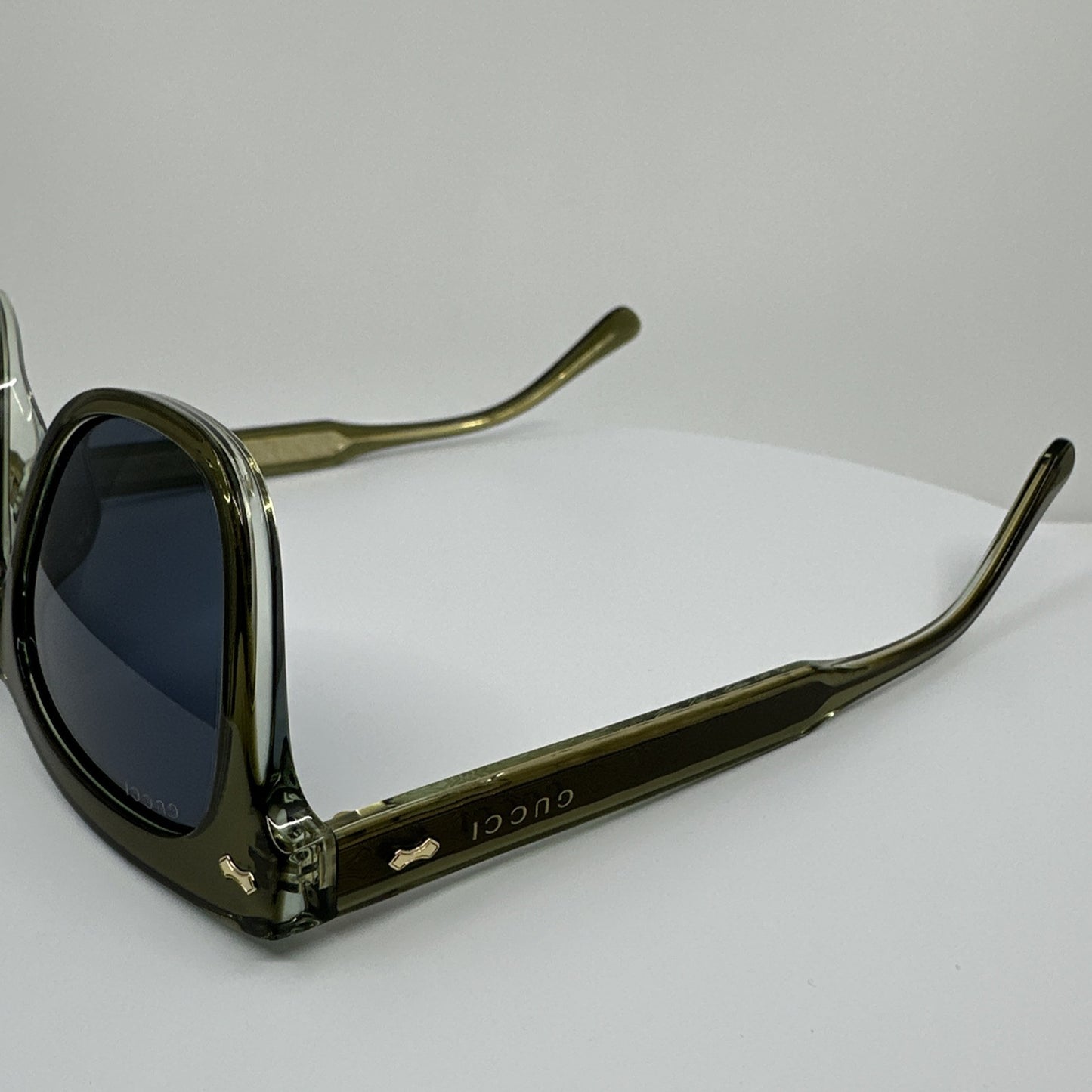 Vintage Gucci GG0910S Green Sunglasses - Super Vision Optical